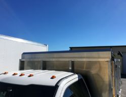 Buyers Products TDH7515 Pull-Style Tarp System with 7.5' x 15' Black Mesh Tarp, Aluminum Deflector and Housing - BUY TDH7515