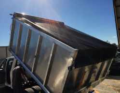 Buyers Products TDH7515 Pull-Style Tarp System with 7.5' x 15' Black Mesh Tarp, Aluminum Deflector and Housing - BUY TDH7515